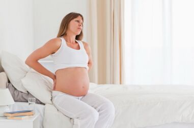Back pain in the girl's pregnancy